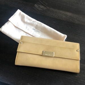 Beige patent leather clutch